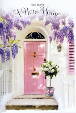 This photograph evokes the feeling of moving into a new Wood Green home on a gentle spring day, with the doorway styled as though a florist has composed it like a greeting card brought to life. The focal point is a soft pink front door, its pastel shade reminiscent of delicate rose petals, set into a smooth, white-painted wall that brightens the entire scene. The door's surface looks carefully finished, with clear lines around the panels and edges that catch a warm glow from the ambient daylight. Above, cascades of wisteria spill down in luxuriant clusters, each stem draped with dozens of tiny, fragrant flowers in hues of lavender, lilac, and pale mauve. The blossoms form an airy canopy over the doorway, echoing the lush, leafy character of the gardens tucked behind the terraced streets off Turnpike Lane. Nestled at the base of the door, a chic tin bucket serves as a vessel for an abundant arrangement of white and cream roses. These blooms are full and round, their petals tightly layered at the centre and gently unfurling at the edges, giving the impression of freshness and careful conditioning. Slender sprays of soft green foliage weave through the roses, adding texture and a hint of woodland calm. A pale pink ribbon is tied around the bucket, its bow loose and graceful, reinforcing the gentle, romantic palette. Light filters through the wisteria and across the step, creating subtle patterns of shadow that lend the image depth and intimacy. Everything about the composition speaks of welcome and transition: a floral tribute to a new beginning in Wood Green, perfectly suited for congratulating someone on a house move, offering not just flowers but a sense of comfort, optimism, and homecoming.